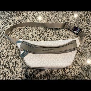 Michael Kors Fanny bag new condition never used.  Double pocket zipper